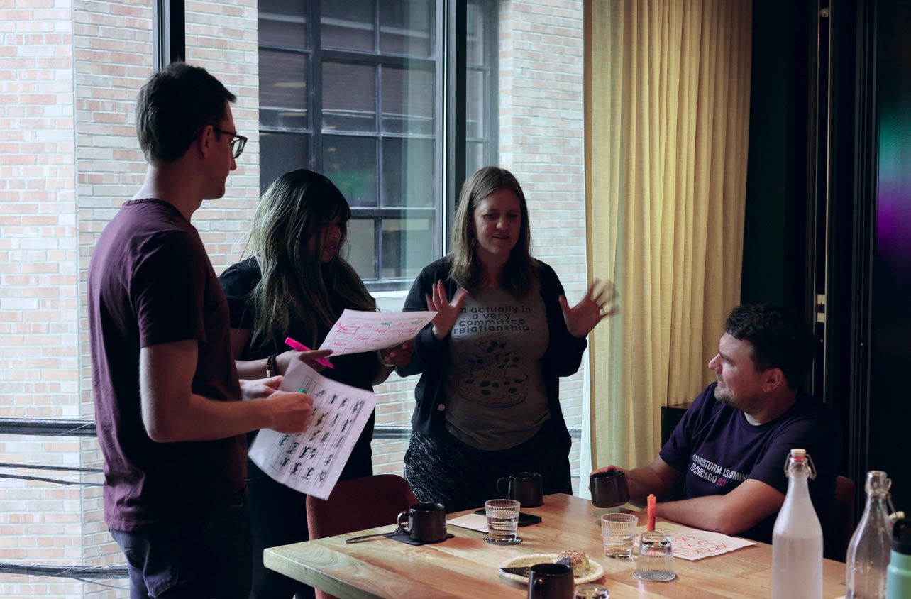 Emily, Sandie, Andy, and Neil participating in the IDEA activity