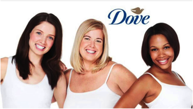 Three female-presenting people of different skin tones smile towards the camera. The "Dove" logo is visible in the top right corner.