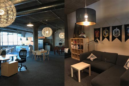 The library and kitchen area of a modern office.