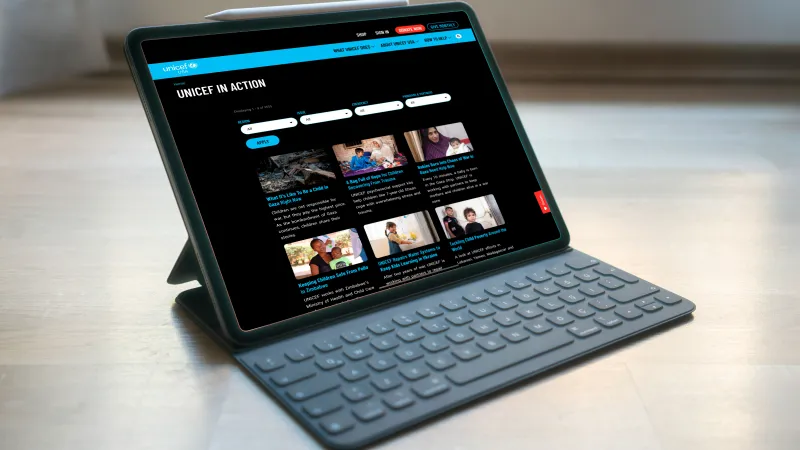 A view of the UNICEF USA news page with a grid of photos and titles for each.
