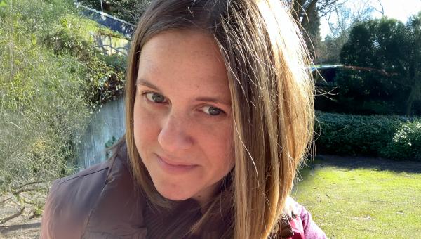 Emily Kodner, a white woman with dark blond hair outside